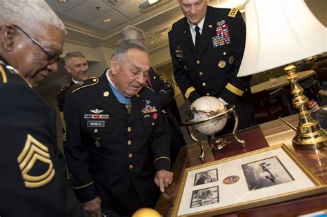 Medal of Honor recipients Army Master Sgt. Jose Rodela, center, and Sgt ...