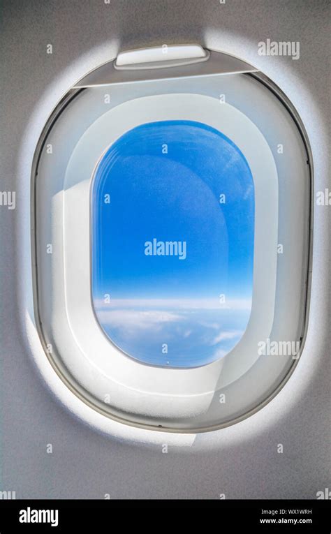 Blue sky from the airplane window Stock Photo - Alamy