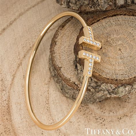 Tiffany & Co. Yellow Gold Tiffany T Diamond Wire Bracelet | Rich Diamonds