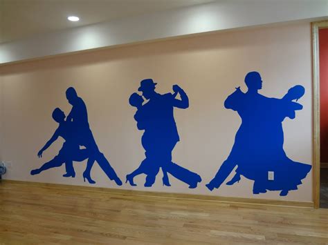 Die-cut adhesive vinyl graphics in opaque blue applied onto interior wall - For more information ...