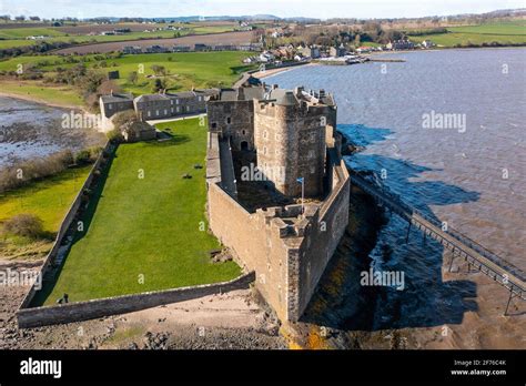 Aerial view from drone of Blackness Castle on Firth of Forth in ...