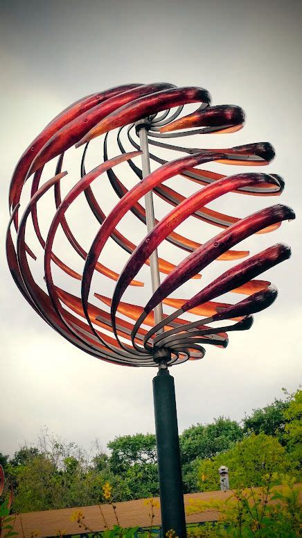 Exquisite kinetic wind sculpture by Mark White Studios. These beautiful, custom made moving ...