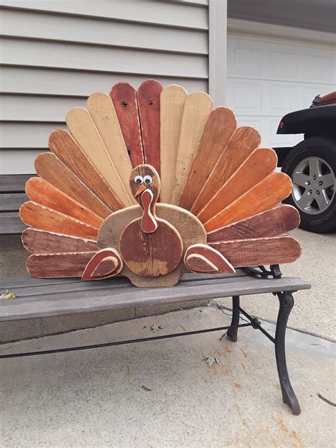 One of our many Thanksgiving creations. A combination of pallet wood and old barn boards ...