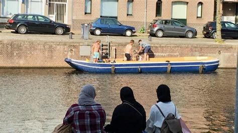 2 Students on either side of a canal, Groningen | Download Scientific ...