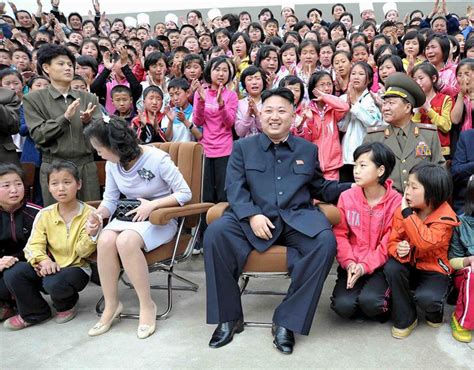 Kim Jong-un and his wife Ri Sol-ju meet children on a visit to the ...