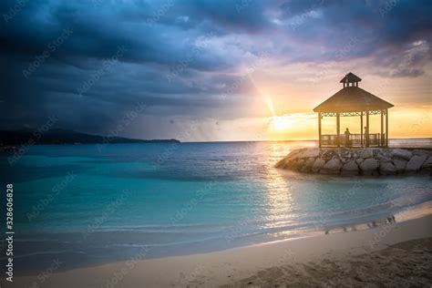 Tropical Island Sunset Stock Photo | Adobe Stock