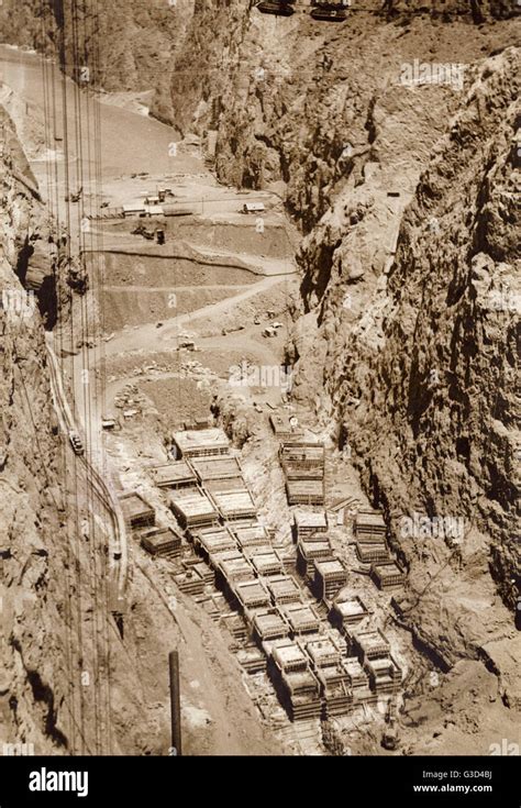 The Hoover Dam (Boulder Dam), Nevada, USA -- construction phase, with the floor of the Black ...