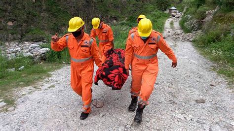 Two people dead and at least 25 trapped by landslide in northern India | World News | Sky News