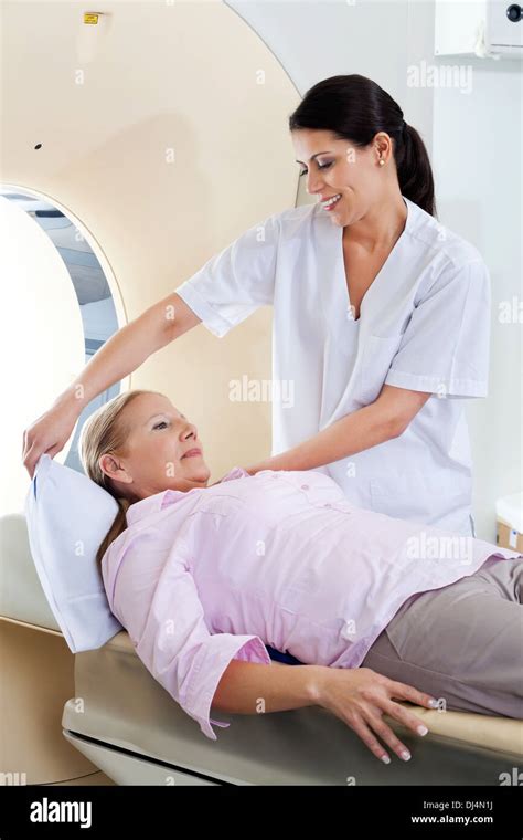 Technician Preparing Patient For CT Scan Stock Photo - Alamy