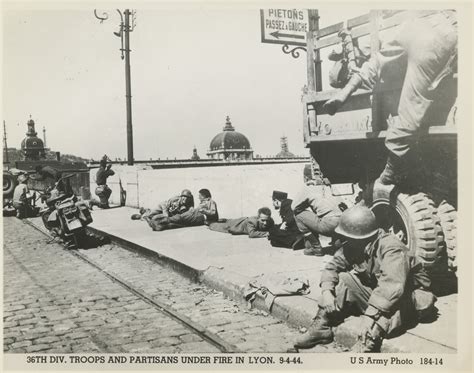 36th Infantry Division and French partisans taking cover on a bridge, Lyon, 1944 | The Digital ...