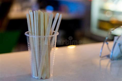 Wooden Sticks in Plastic Cup for Stirring Sugar in Coffee in Cafeteria Stock Photo - Image of ...