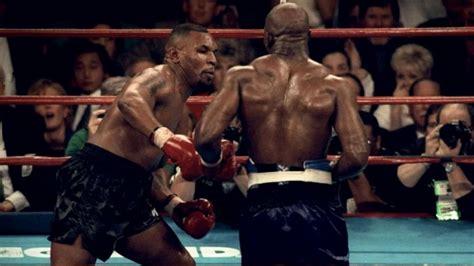 Evander Holyfield defeats Mike Tyson in 1996, violence erupts in 1997 rematch: Part 7 Video ...