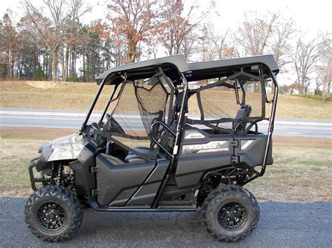 New 2017 Honda Pioneerâ„¢ 700-4 Deluxe Camo ATVs For Sale in North Carolina | www.atvtrades.com