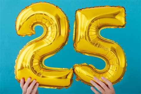 Premium Photo | Gold foil number 25 celebration balloon