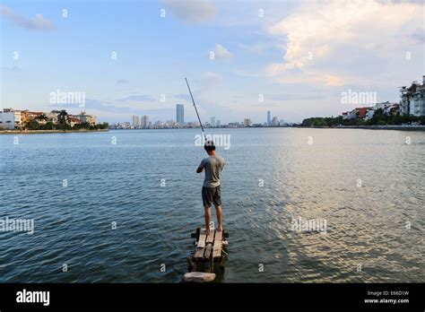 Sunset on West lake, Ho tay, Hanoi, Vietnam Stock Photo - Alamy