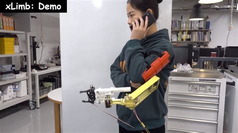 xLimb: Wearable Robot Arm with Storable and Extendable Mechanisms - YouTube