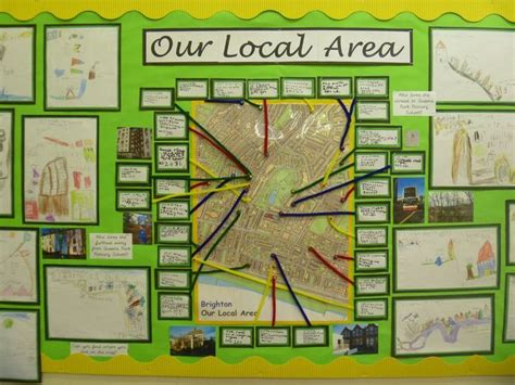 a bulletin board with lots of pictures and words about the area in front of it