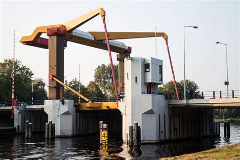 Amsterdam’s historic bridge houses transformed into micro hotel suites | Archello