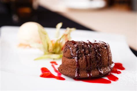 Chocolate Fondant with Ice Cream Stock Image - Image of dessert, cookery: 99718879