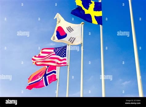 national flags flying in wind Stock Photo - Alamy