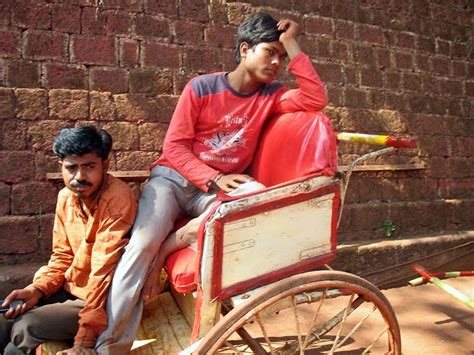 Stock Pictures: Hand Pulled Rickshaw Drivers Portraits