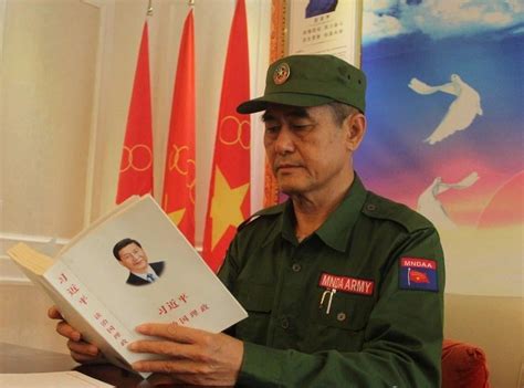 Commander of the MNDAA reading the book "The Governance of China" by Xi Jinping. : r/MarxistCulture