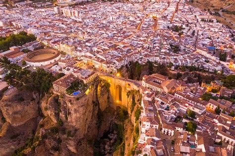 Aerial view of El Tajo Gorge, famous bridge in Ronda during the night ...