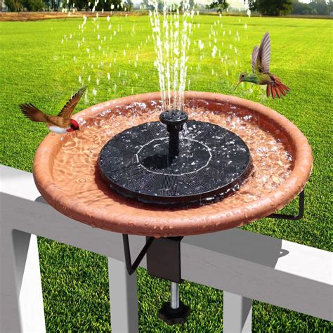 Solar powered fountains attract birds to bird baths - Sigloxxi