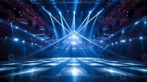 blank live show stage with fantastic dazzling blue laser lighting in big hall. performance show ...