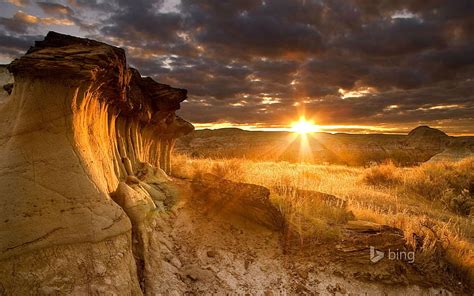 HD wallpaper: Sun shining rock-Bing theme wallpaper, brown mountain ...