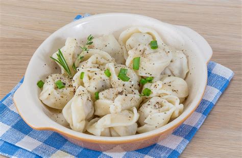 Russian dumplings on wood 12783227 Stock Photo at Vecteezy