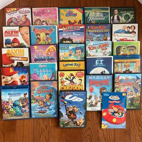 sylvania | Toys | 27 Dvds For Children Bundle Includes Portable Dvd Player Wireless Earbuds ...