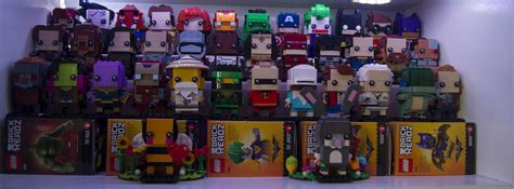 My new BrickHeadz Themed shelf. Added Led strips to make it pop! : r/lego