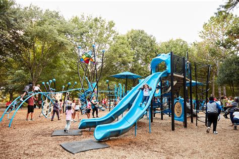 Multicultural Kids Playing On Playground