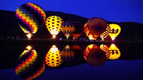 Hot Air Balloon "Night Glow" Reflected in Lake - YouTube