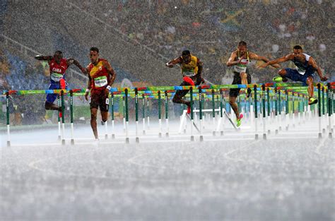 8 stunning photos from the rain-soaked track and field events at the ...