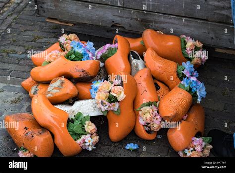 Dutch clogs filled with flowers Stock Photo - Alamy