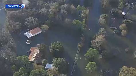 Texas weather: SkyEye video shows homes surrounded by high water near Lake Conroe in Montgomery ...