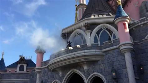 Maleficent appears on Sleeping Beauty Castle | Disneyland Paris - YouTube