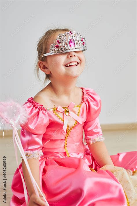 Little girl enjoying her role of princess. Adorable cute 5-6 years old ...