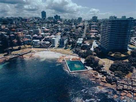 Aerial View of a Tropical Beach with Rows of Colorful Beach Houses in ...