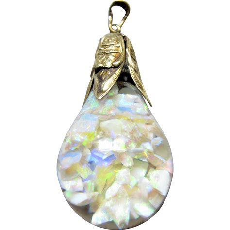 An amazing floating opal pendant that has a tremendous amount of fire ...