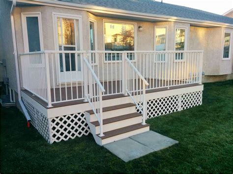 Trex deck with white fascia and railing | Outdoor renovation, Deck railings, House deck