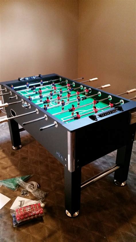 Foosball table assembly - Hedgehog Home Services, LLC