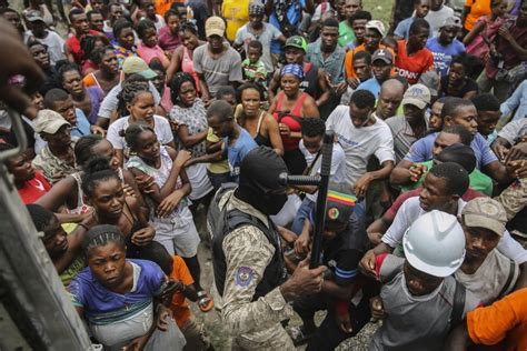 Desperate search for earthquake survivors continues in Haiti as storm ...