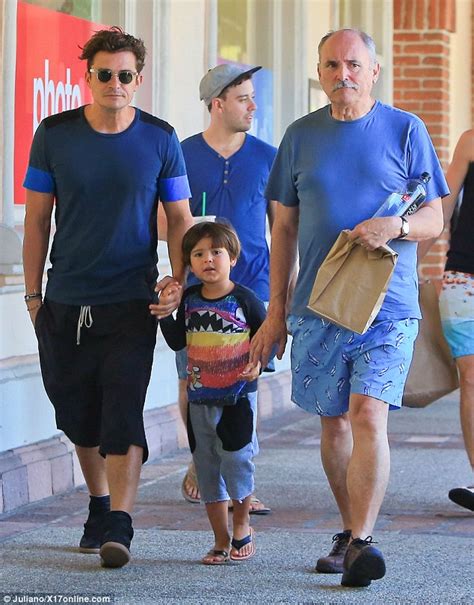 Orlando Bloom enjoys sunny day out with his son Flynn and dad Harry ...