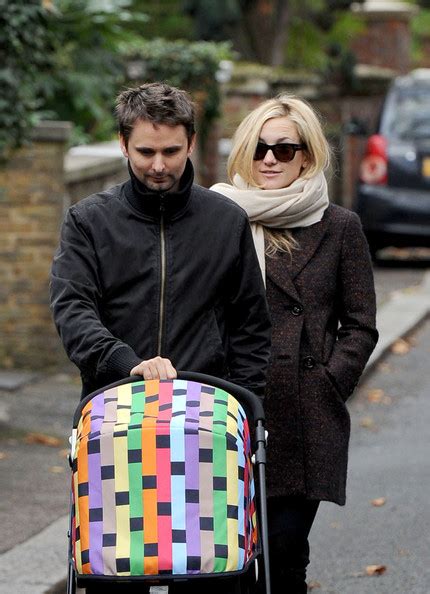 Kate Hudson and Matthew Bellamy wrap up warm as they stroll with their ...