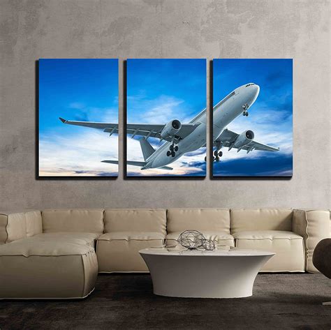 Wall26 3 Piece Canvas Wall Art - Commercial Airplane Flying at Sunset ...