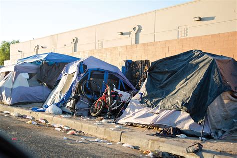 AMERICA IS Under Siege : Sweltering streets: Hundreds of homeless...