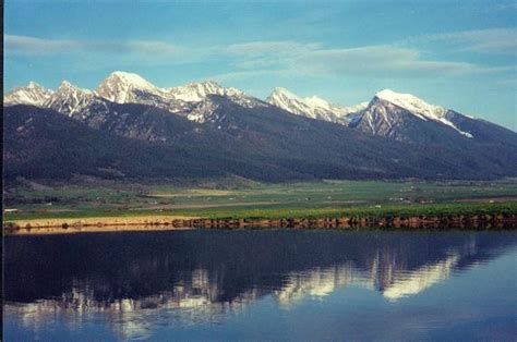 Charlo, MT : Mission Mtn Range reflecting in Charlo, MT pond of Olsen ...